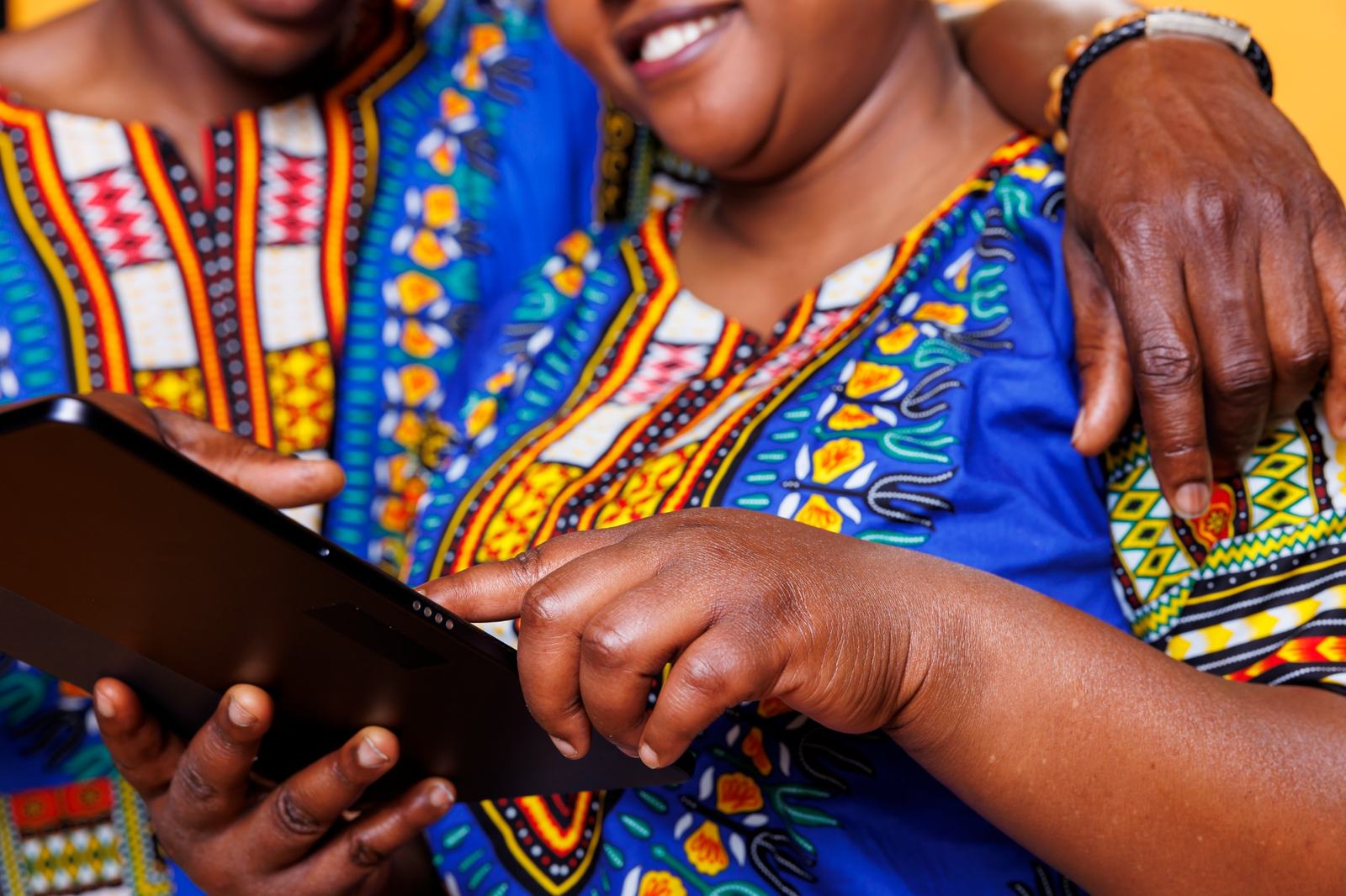Business owners using a tablet together